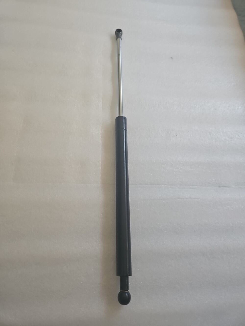 Gas Spring, also known as a gas strut or gas damper.